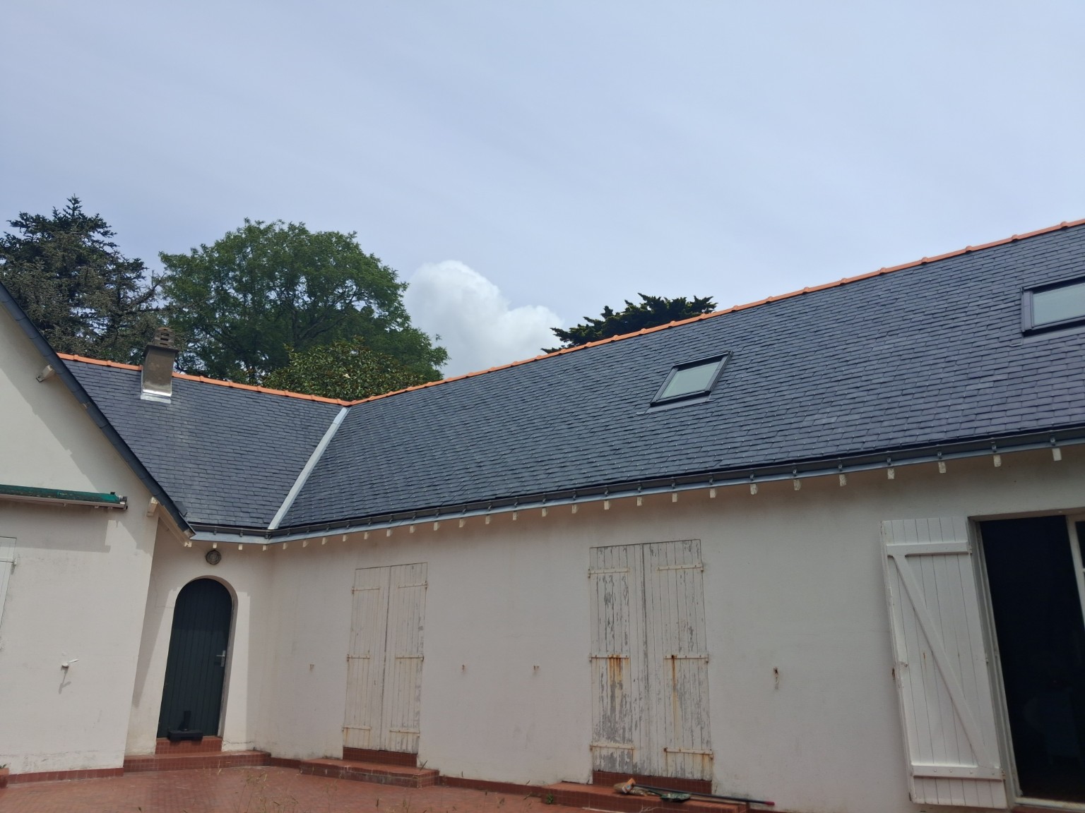 Travaux de couverture ardoise sur une maison à Pornichet